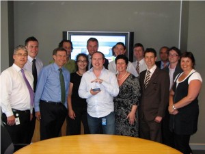 Project Team members with the Secretary of Transport and the award. Murray Wills on the far left.